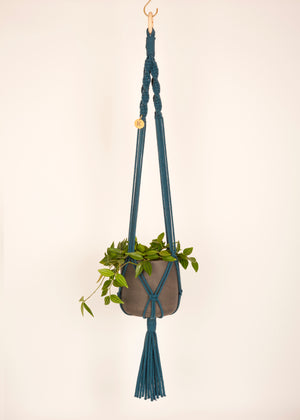 Modern, eco friendly macramé Plant Hanger in Peacock Blue, Twisted knot style in maxi length (c95cm). Handmade from 100% recycled cotton, with a free brass hanging hook and beautiful eco-friendly gift box. Perfect gift for plant lovers
