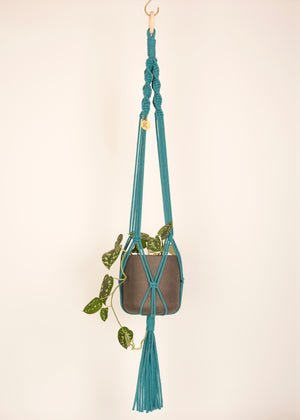 Modern, eco friendly macramé Plant Hanger in Enamel Blue, Twisted knot style in maxi length (c95cm). Handmade from 100% recycled cotton, with a free brass hanging hook and beautiful eco-friendly gift box. Perfect gift for plant lovers.