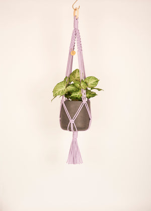 Modern, eco friendly macramé Plant Hanger in Lavender, Block knot style in midi length (c75cm). Handmade from 100% recycled cotton, with a free brass hanging hook and beautiful eco-friendly gift box. Perfect gift for plant lovers.