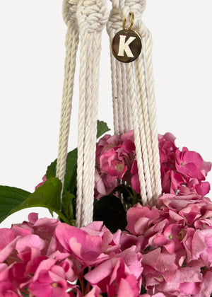 Cream Outdoor Plant Hanger handmade from 100% cotton and treated with eco-friendly waterproof spray, shown here with a Hydrangea