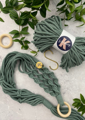 Make your own Macramé Plant Hanger kit in Sage, with brass S hook, engraved brass Knotted tag and wooden macramé ring.