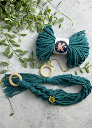 Make your own Macramé Plant Hanger kit in Enamel Blue, with brass S hook, engraved brass Knotted tag and wooden macramé ring.