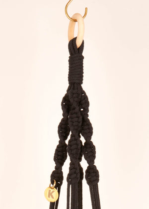 Close up of Twisted knot style in Charcoal Black macramé Plant Hanger, handmade from 100% recycled cotton