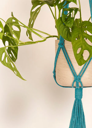 Close up of Enamel Blue macramé Plant Hanger, handmade from 100% recycled cotton